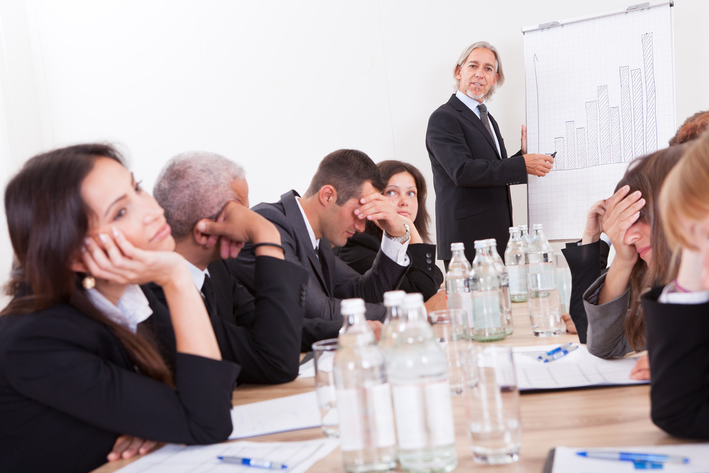 Photo Of Sad Business Team Attending The Seminar